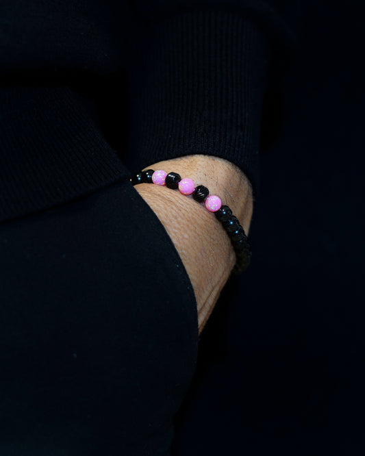 BLACK MAMBA BRACELET WITH BLACK OBLIQUE TEXTURED STAINLESS STEEL, COMBINE WITH  SILKY PINK GEMS. THE SPECIAL MUDRA CHAIN`S THREE DOTS DESIGN.