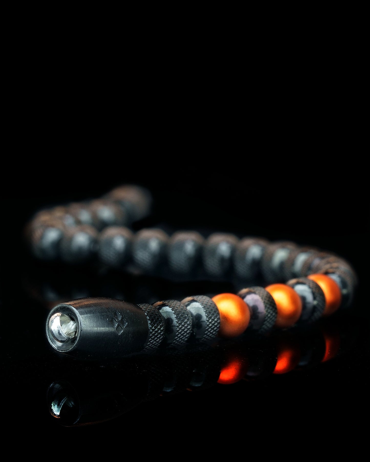 BLACK MAMBA BRACELET⬩ RUDRAKSHA TEXTURE⬩ ORANGE ANODIZED ALUMINUM THREE DOTS